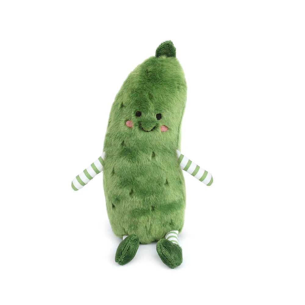 Plush toy shaped like a green pickle with a smiling face on a white background