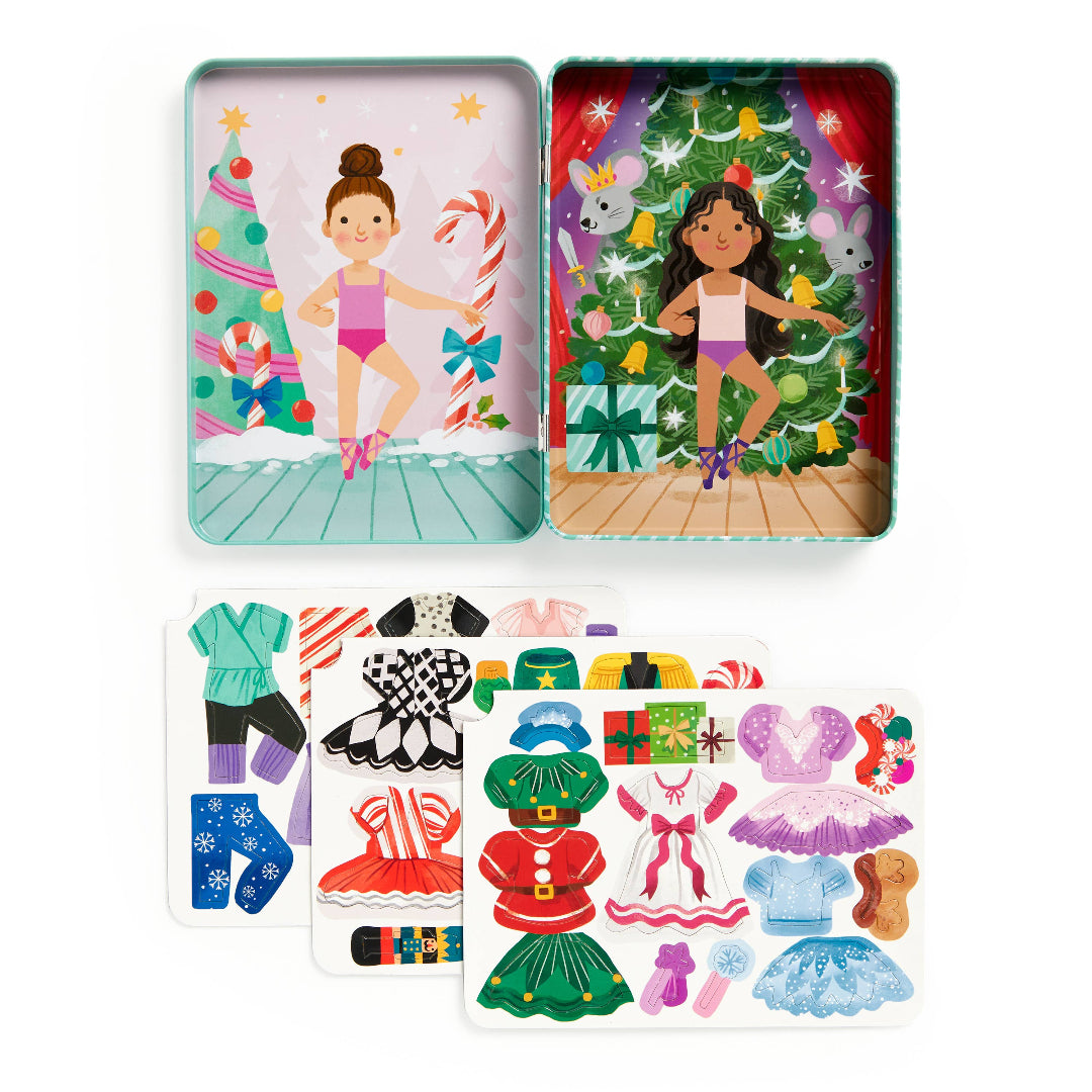Toy dress-up set with two character cards and various clothing pieces on a white background