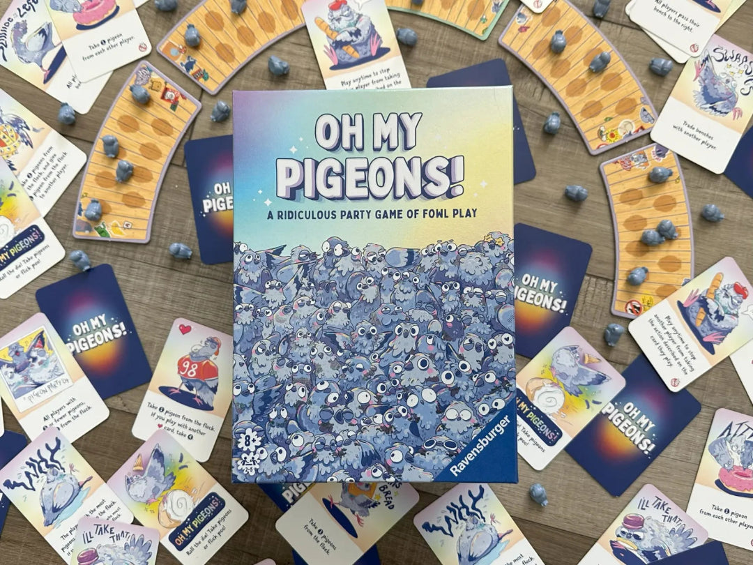 Board game 'Oh My Pigeons!' with cards on a wooden surface