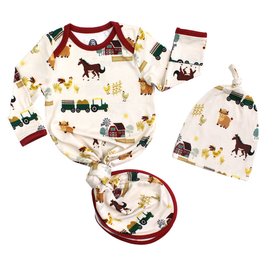 On the Farm bamboo newborn gown and hat baby gift set with horse and tractor print, soft, breathable, and hypoallergenic for sensitive skin.