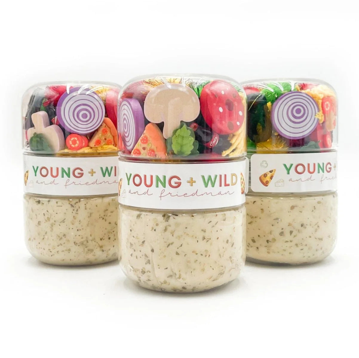 Three jars of 'Young & Wild' gummy bears on a white background