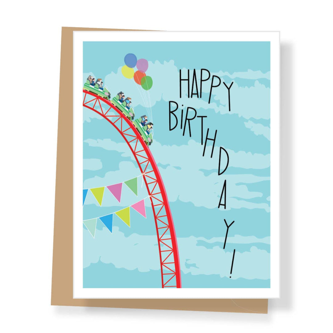 a birthday card with a rollercoaster on the cover with balloons and a banner