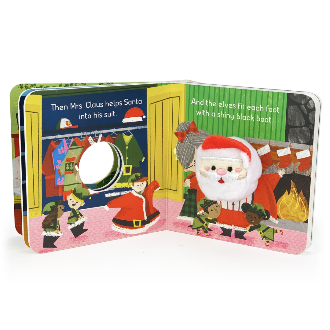 inside pages of christmas book with santa puppet on page