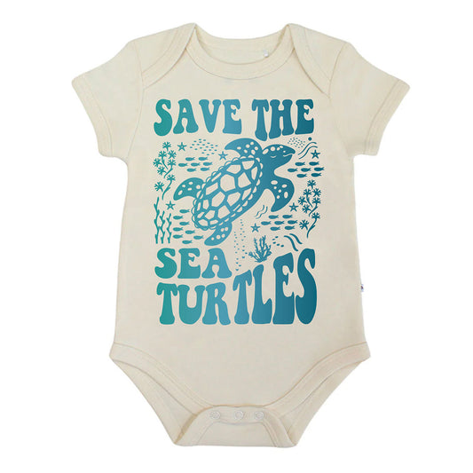 Our Save the Sea Turtle Cotton onesie flat lay in a white background.