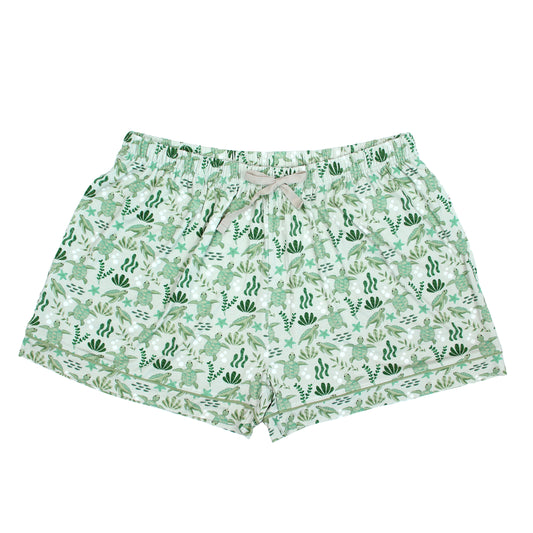 Save the Sea Turtles women's bamboo pajama shorts by Emerson and Friends. Featuring a soft sea-green background with hand-drawn turtles, seaweed, and starfish, these eco-friendly shorts are designed for ultimate comfort and sustainability.
