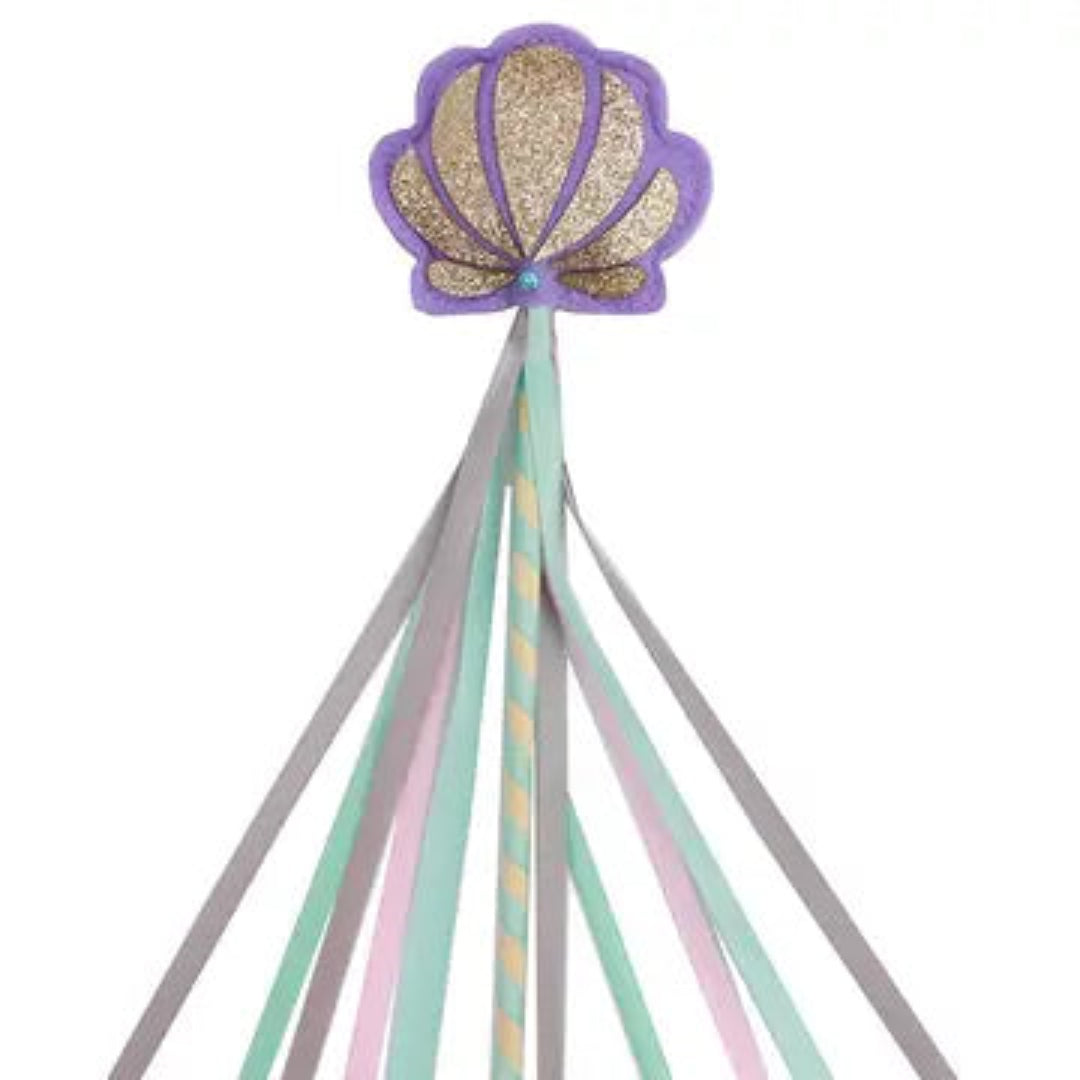 princess wand with a purple and gold shell on the top and streamers hanging from it
