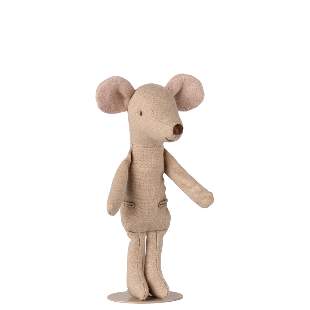 Stuffed toy mouse in a beige outfit on a white background
