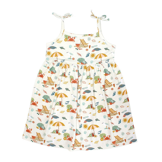the "beach day" bamboo sundress. the "beach days" print is a scattered print of beach umbrellas, beach balls, sand buckets and shovels, coral, shells, beach chairs, seagulls, flipflops, and sunglass mixed in a orderly and creative way.