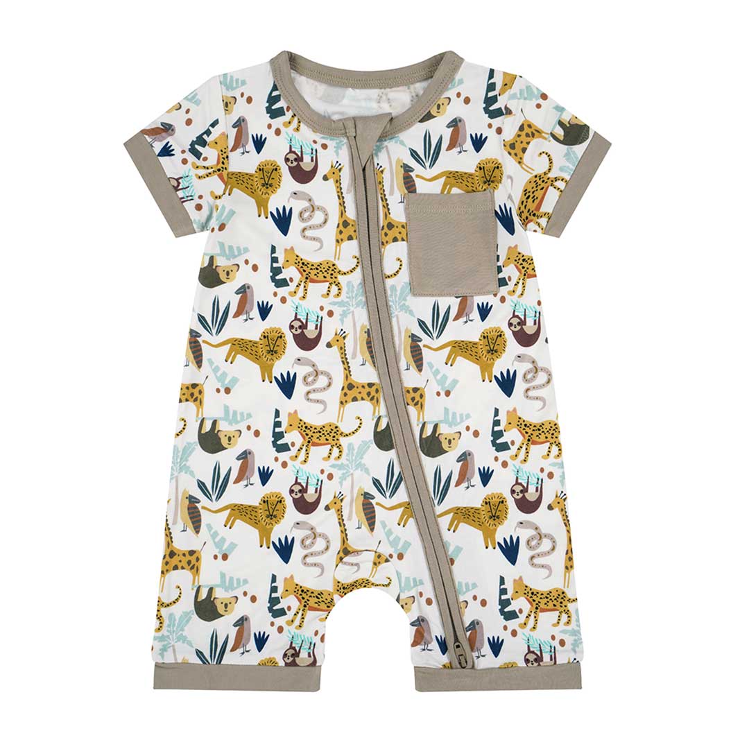the "jungle friends" shortie romper. the "jungle friends" print is a mix of jungle animals that include giraffes, lions, cheetahs, sloths, snakes, and forest plants.
