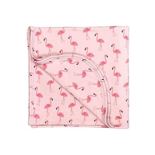 the "fancy flamingos" bamboo blanket. the "fancy flamingos" print is a pattern of multiple pink flamingoes scattered around the print.