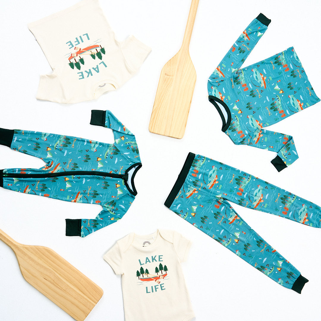 flat lay of the "jump in the lake" matching set, convertible, and the "lake life" tee. v