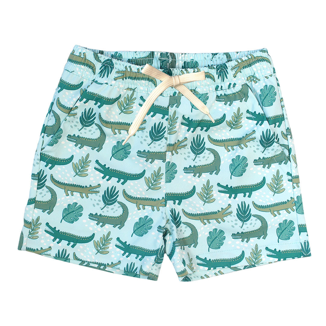 the "later gator" swim trunks. the "later gator" print has a mix of light and dark green alligators, leaves, and white dots scattered on a teal colored background.