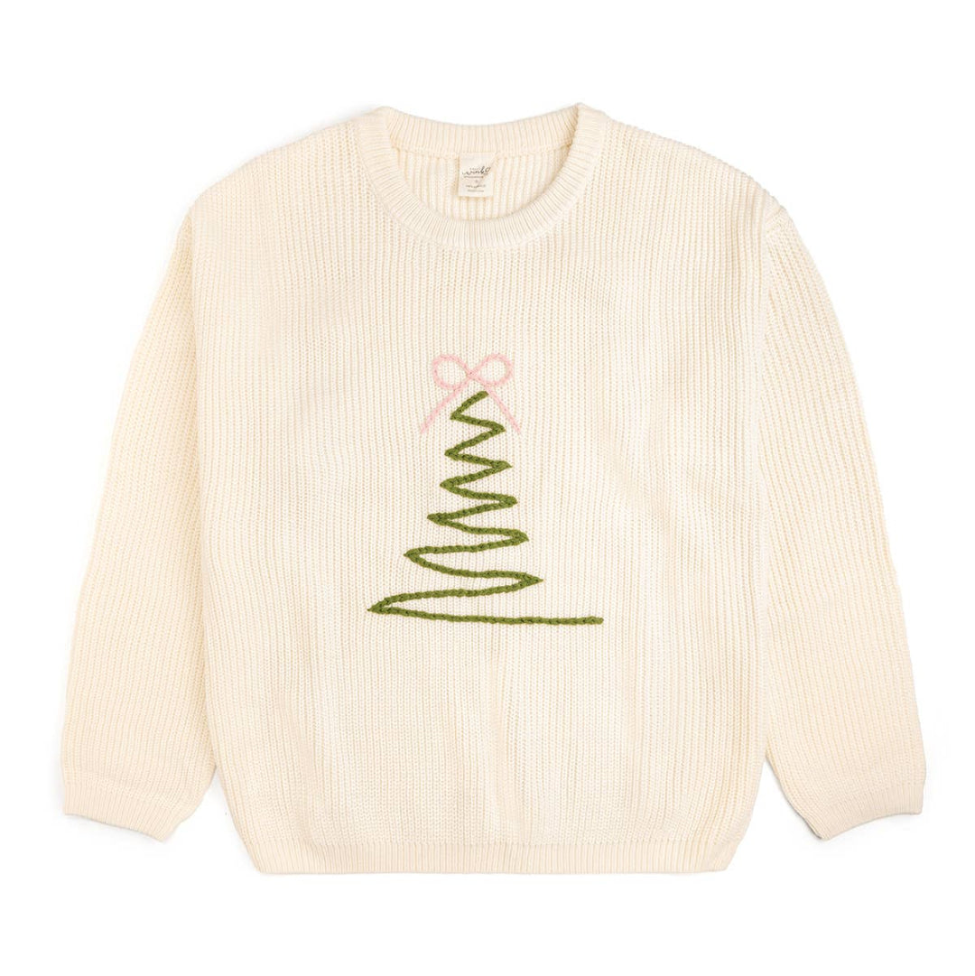 Cream-colored knit sweater featuring a simple green Christmas tree design made of a zigzag line, topped with a pink bow.