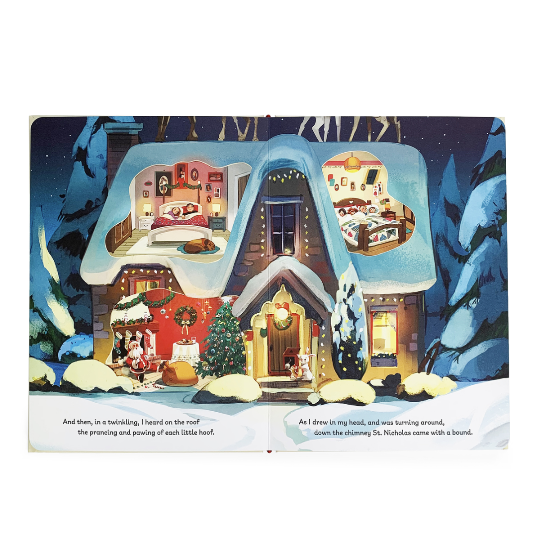 inside pages of book with a big house decorated for christmas