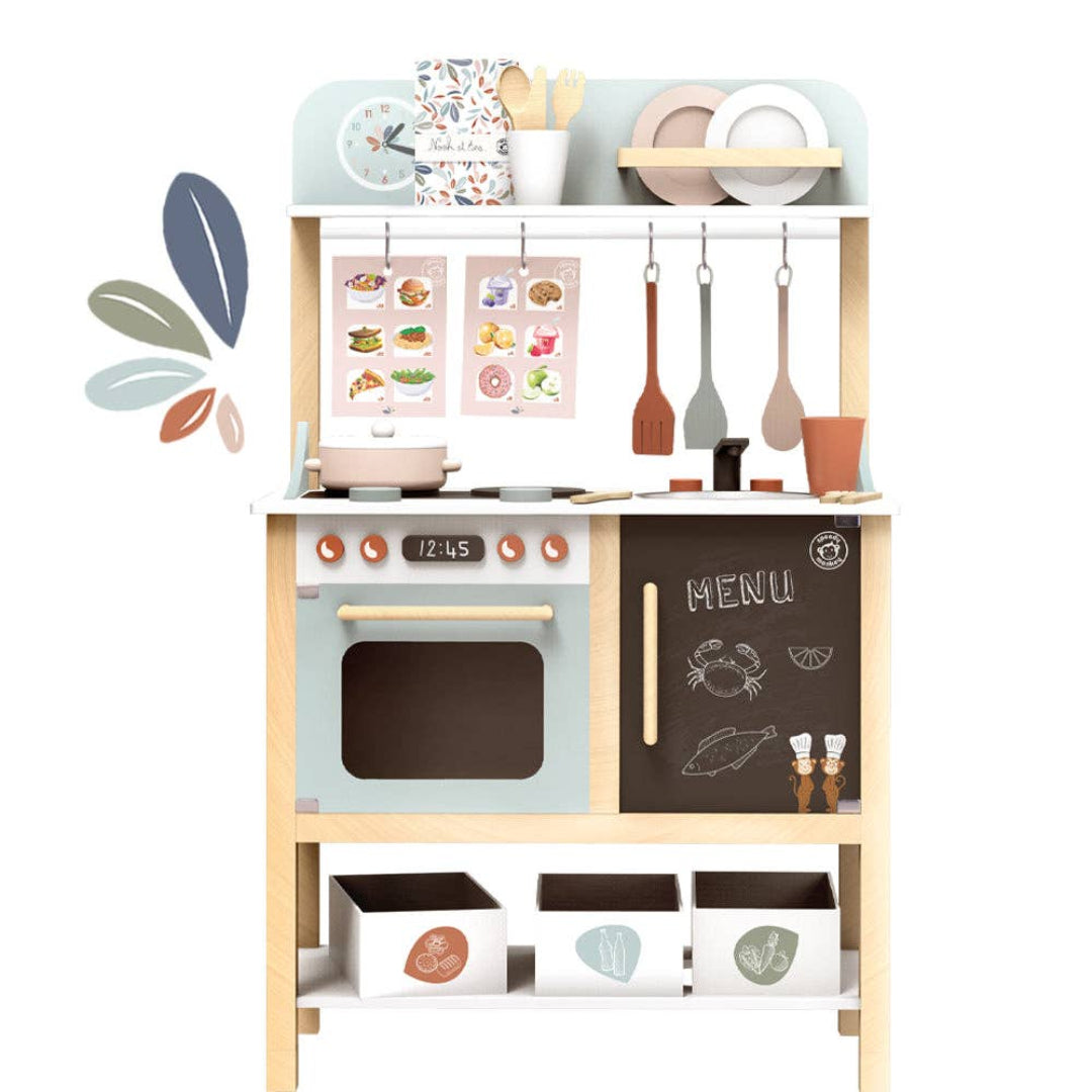 a wooden play kitchen in multi pastel colors and has accessories included such as pans, cooking utensils, plates, and cups. the kitchen has a pretend sink, cook top, and oven.