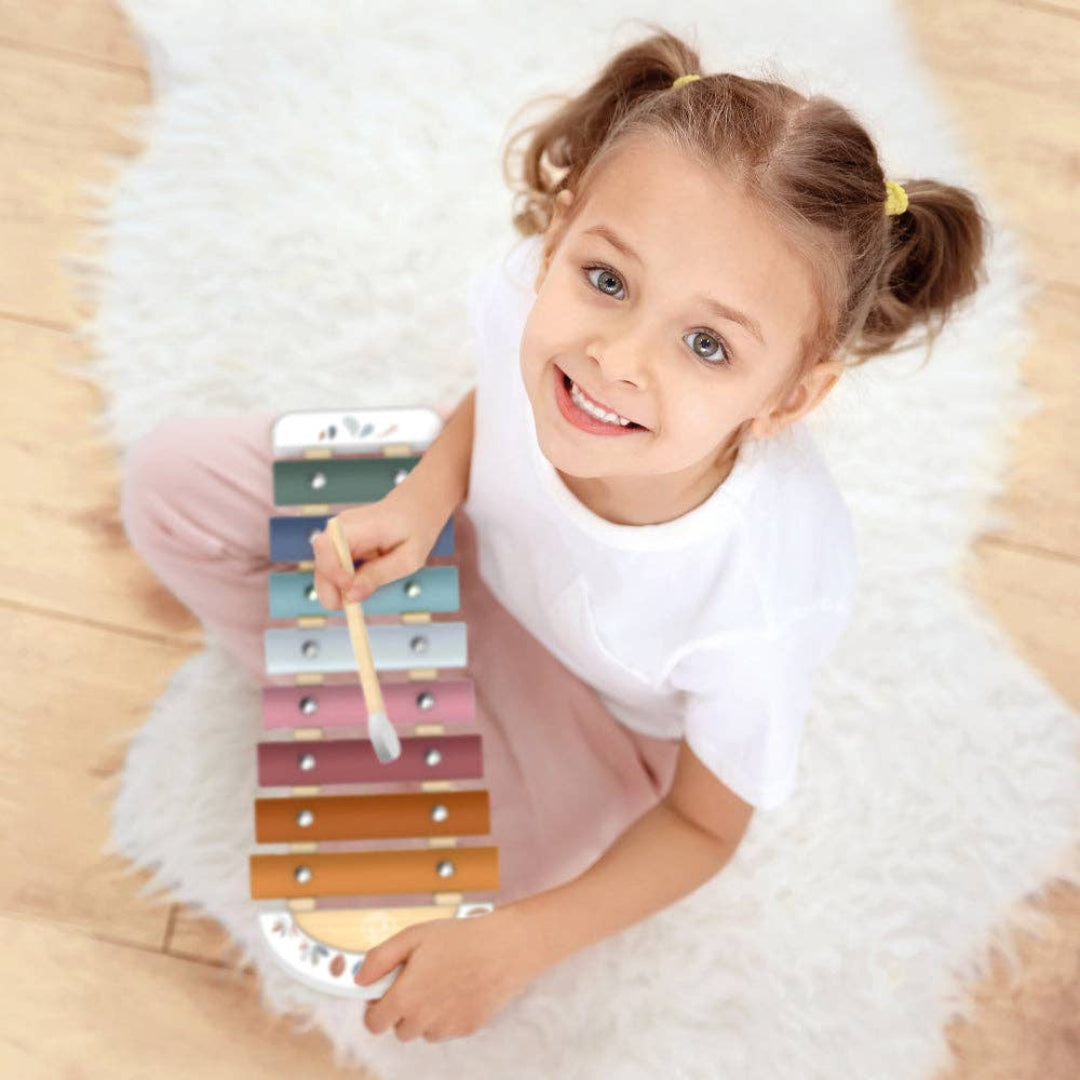 wooden xylophone with rainbow colored keys