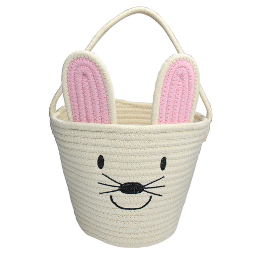 Flat lay white bunny basket on a white background.