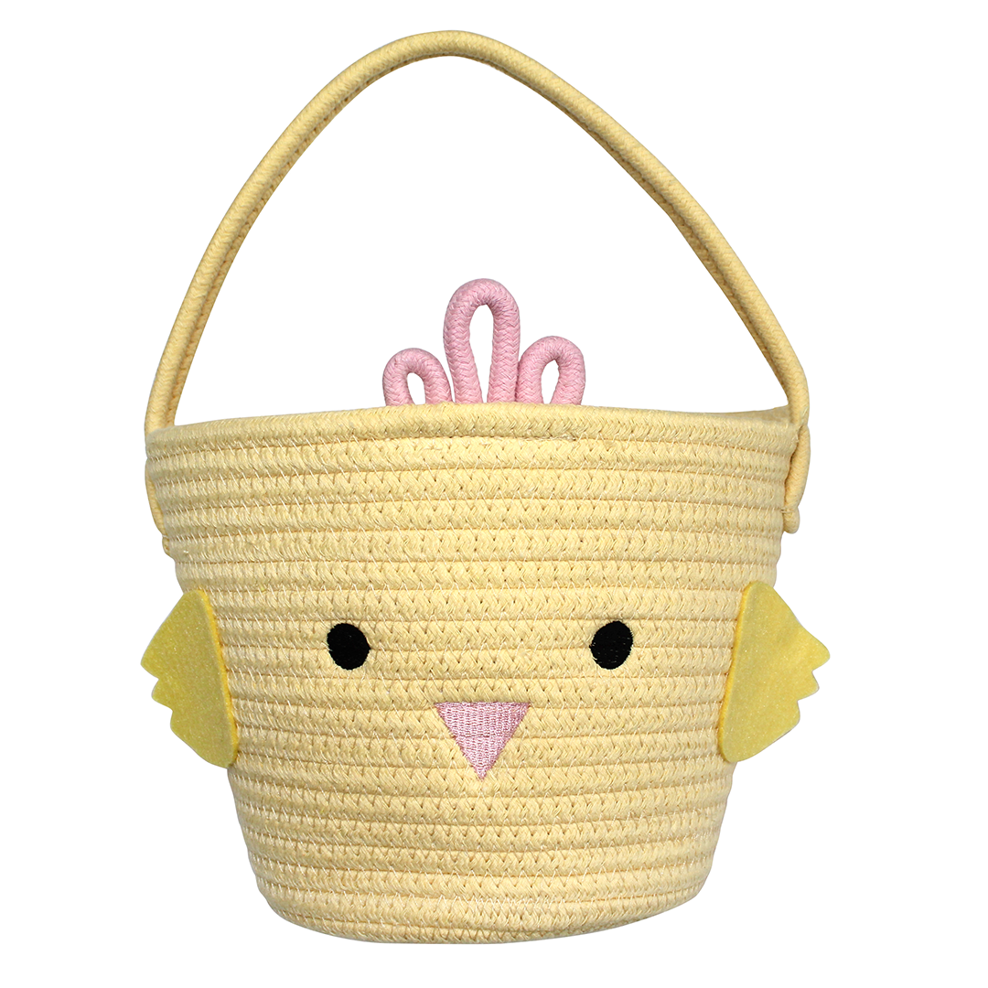 Flat lay of a yellow chicken basket with a cute face on the front, placed on a white background.