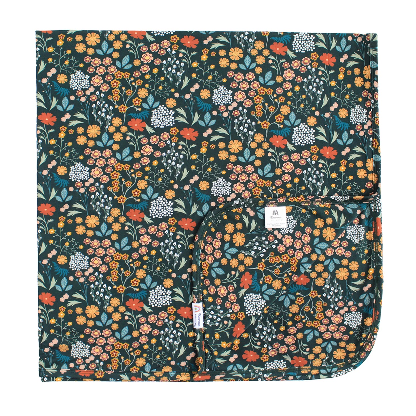 dark green bamboo blanket with floral print on white background. 