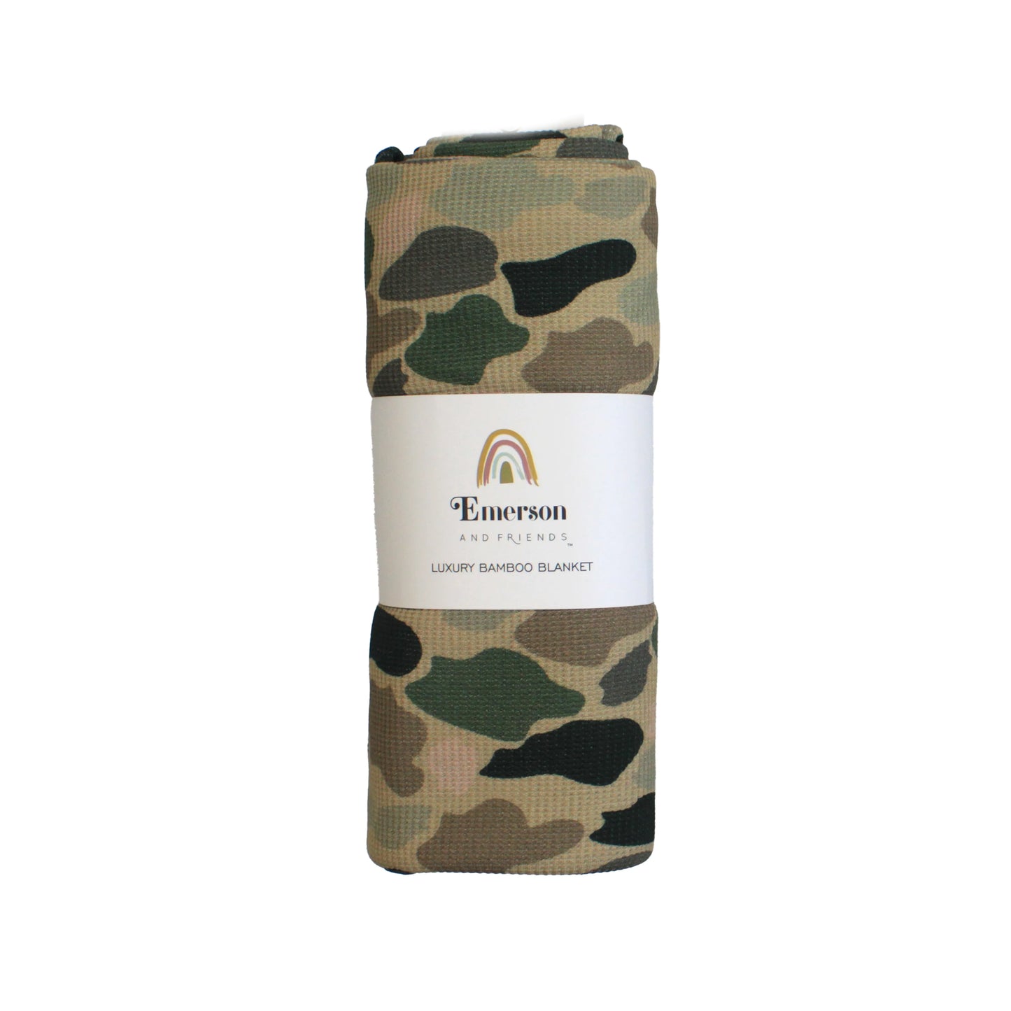 packed camo bamboo blanket on white background.