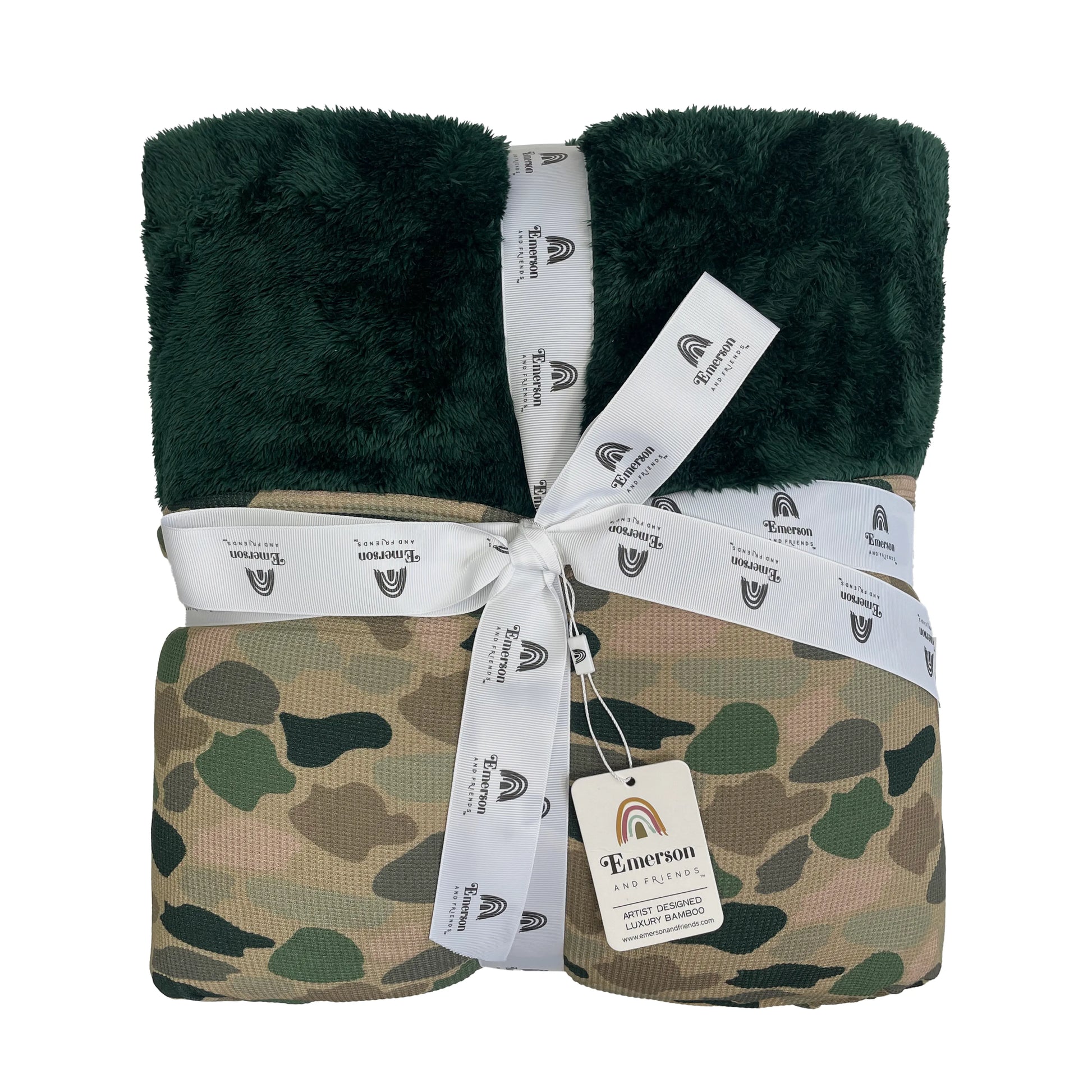 bamboo blanket with camo print and green fleece lining on white background.
