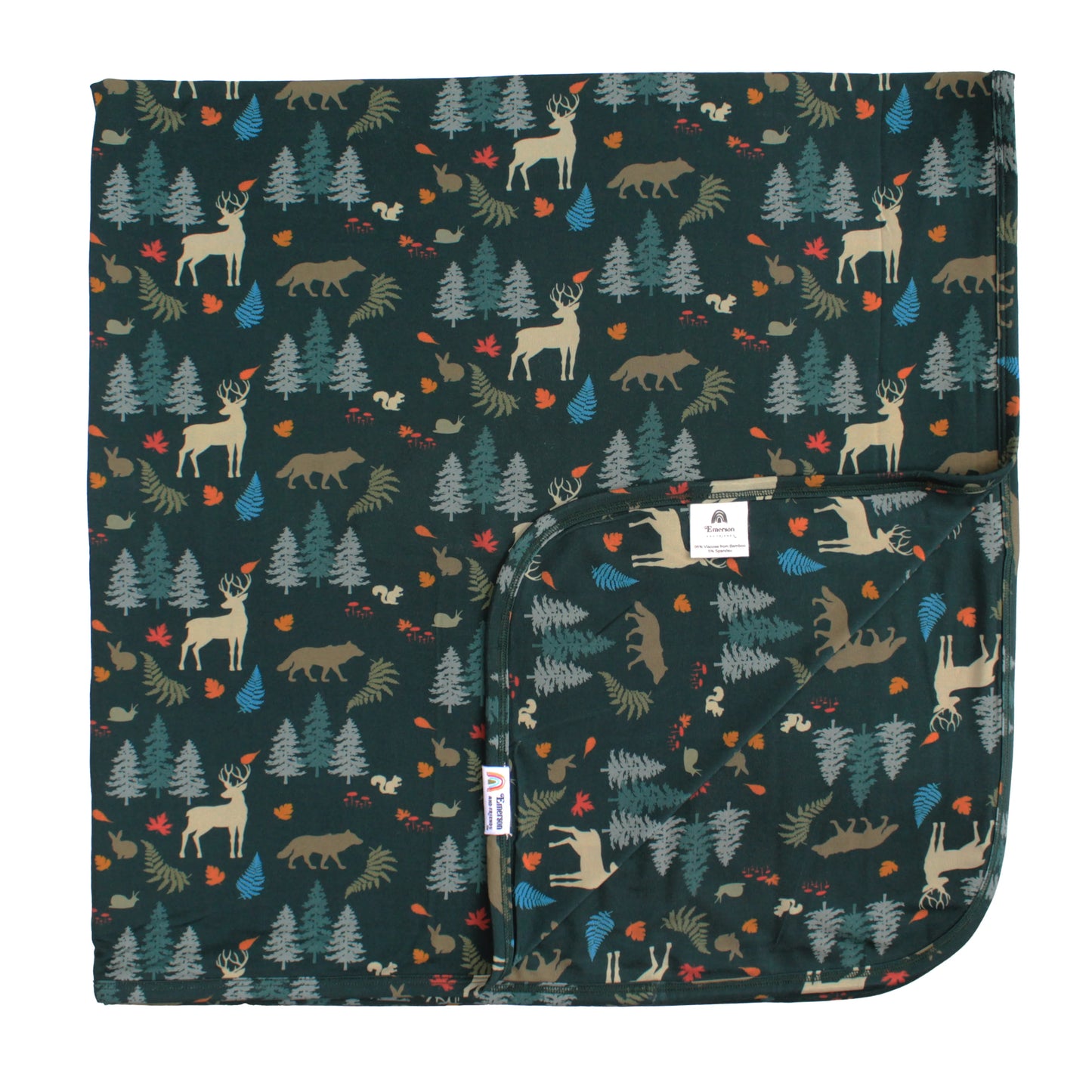 bamboo blanket with forest print on white background.