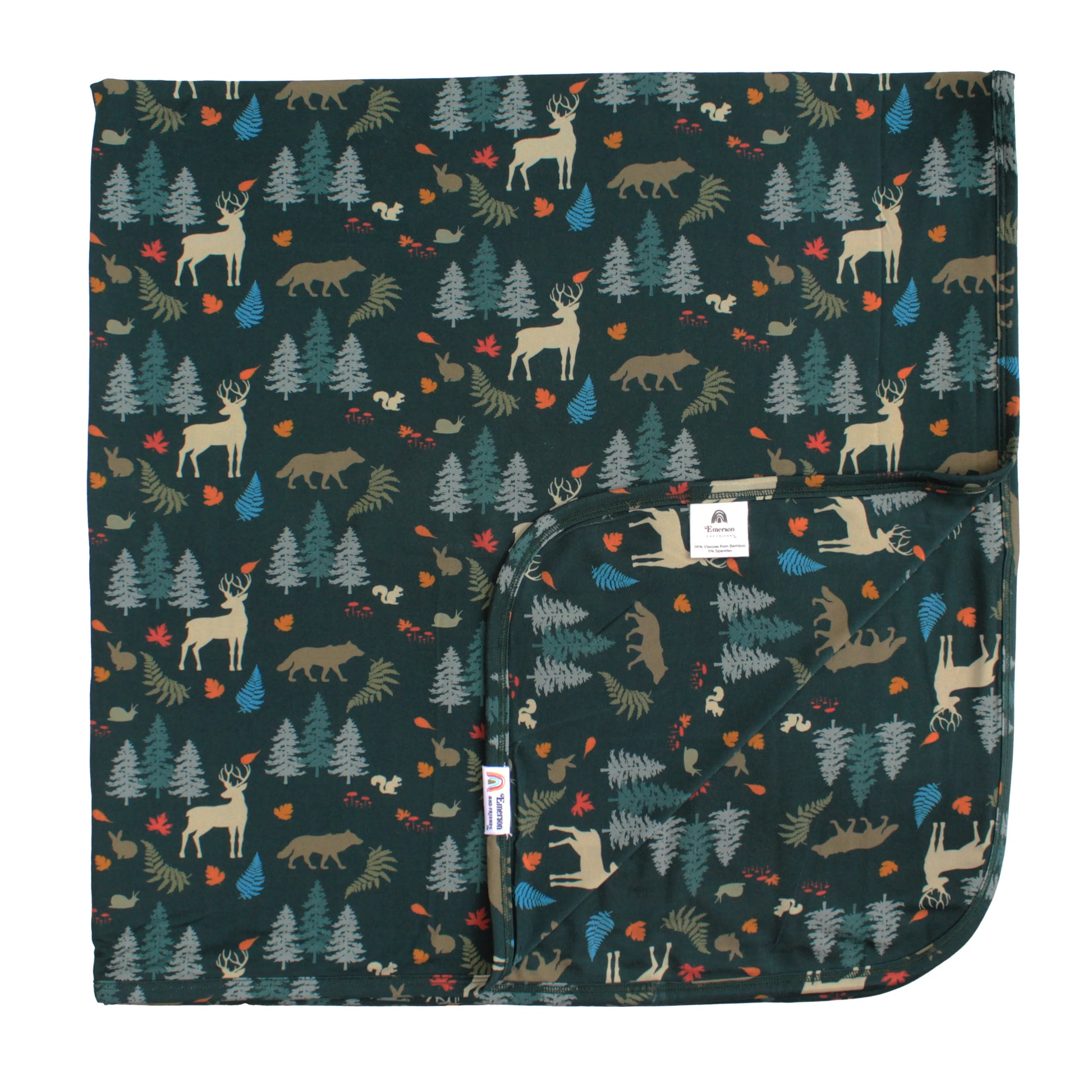 bamboo blanket with forest print on white background.