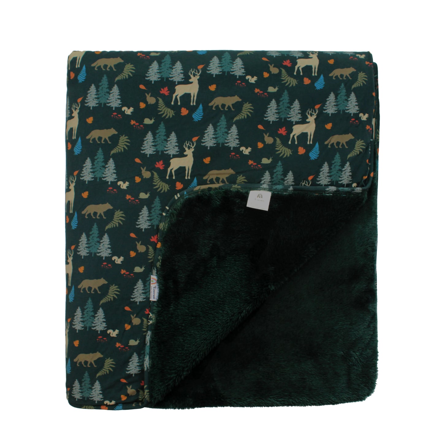 bamboo blanket with forest print and green lining on white background.