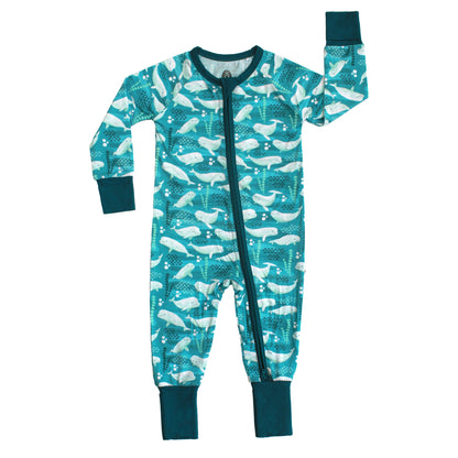 Children's onesie with whale pattern on a white background
