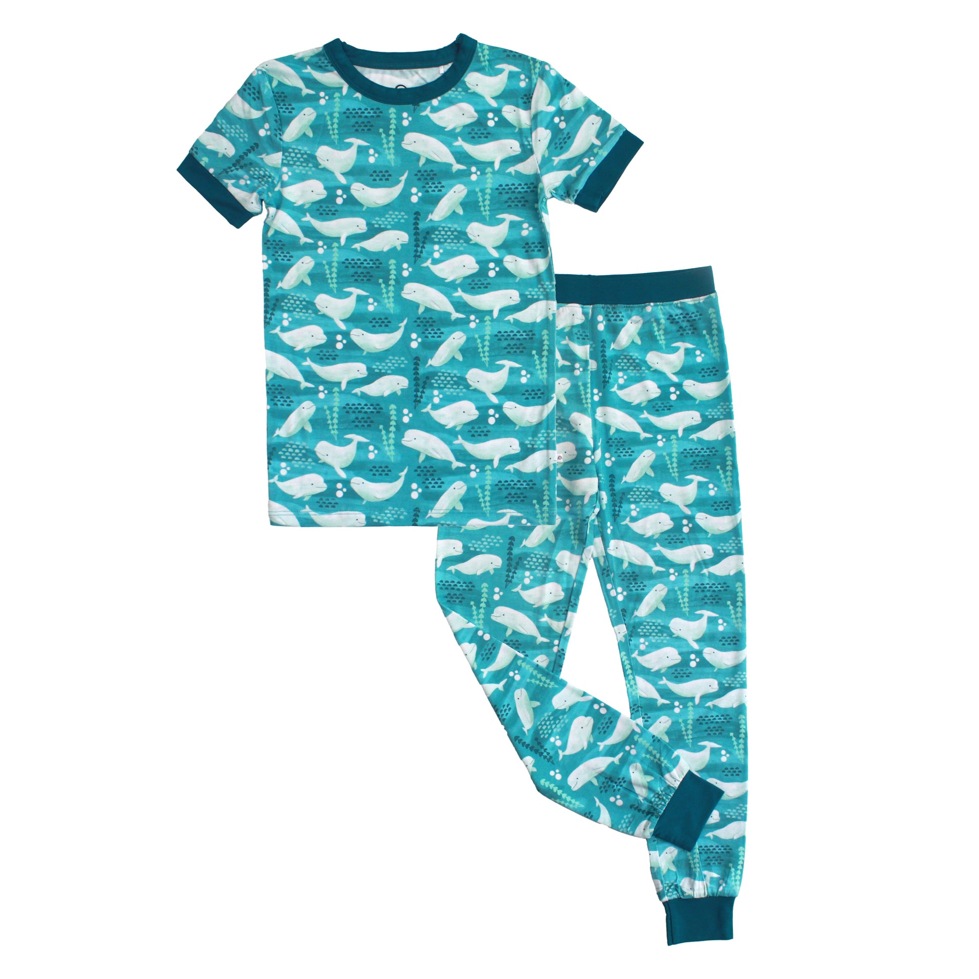 Children's pajama set with whale pattern on a white background