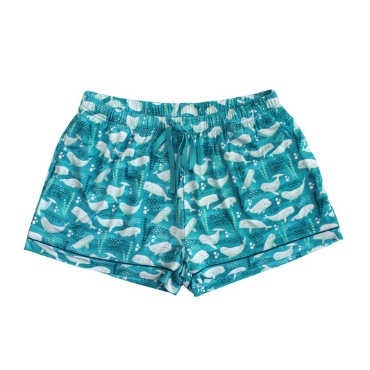 Teal shorts with white whale pattern on a white background