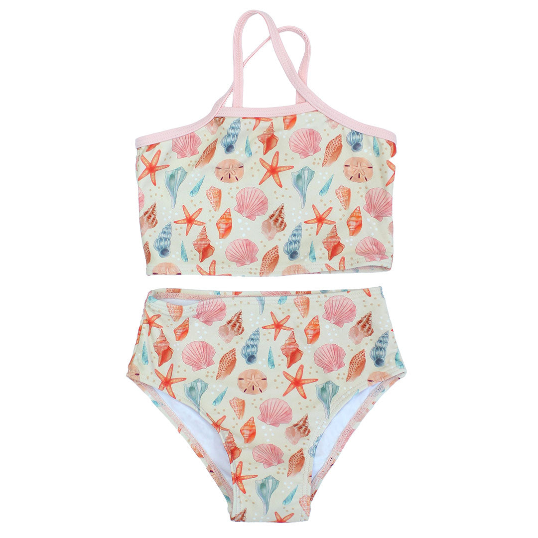 2 piece swimwear for kids flat lay in a white background. The print reflects seashells is different peach, pink and blue colors. The trim on the top is light pink. 