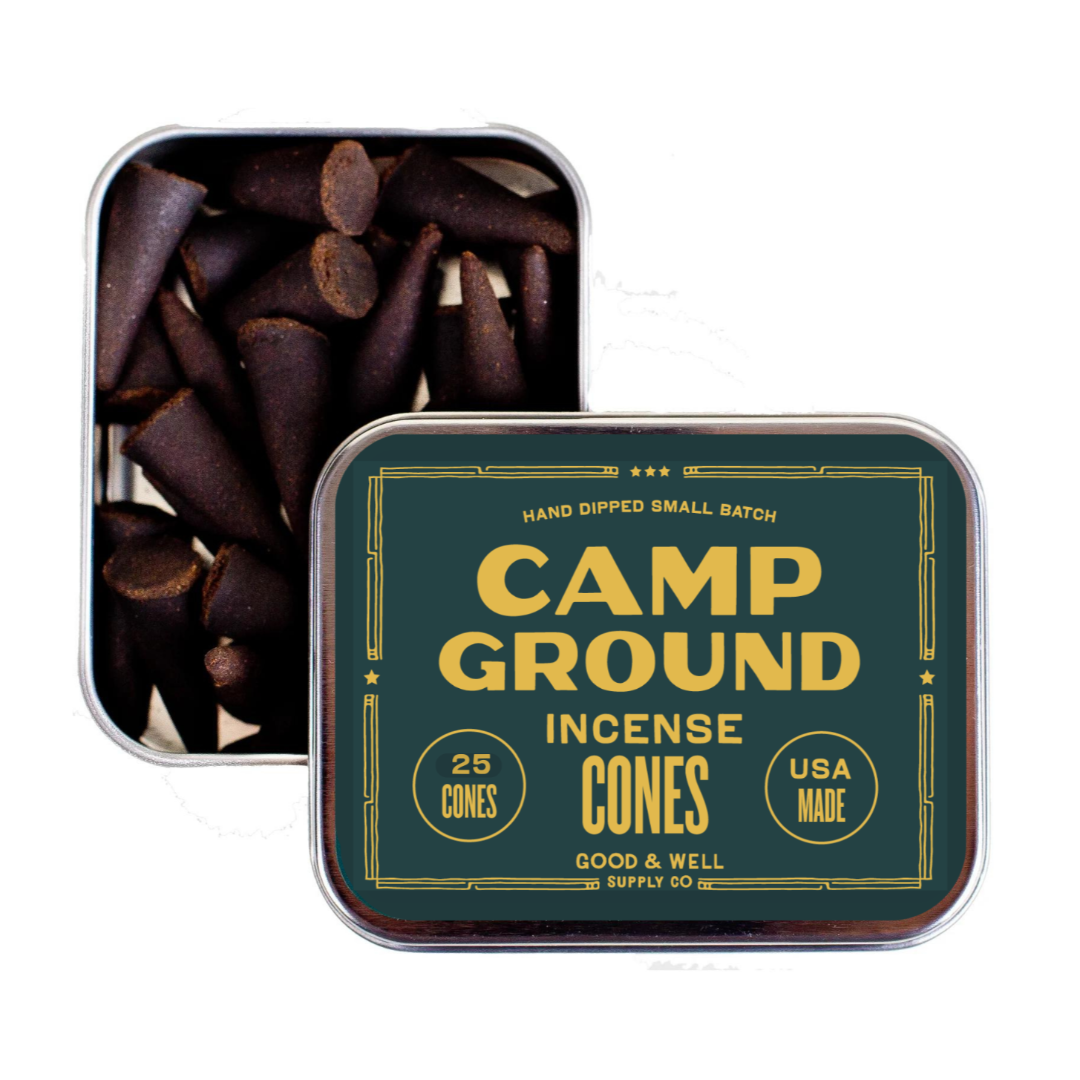 Tin of Camp Ground Incense Cones with visible cones inside on a white background
