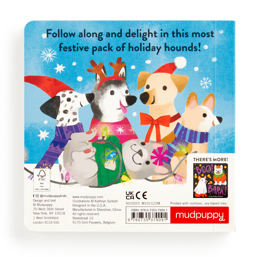 Back cover of a Mudpuppy product packaging with cartoon dogs in festive clothing on a blue snowy background.