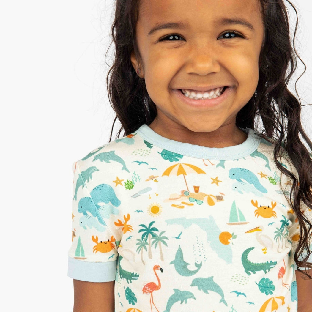 Soft and breathable bamboo pajama set featuring a vibrant Florida-themed print, designed for all-night comfort and easy movement for toddlers and kids.