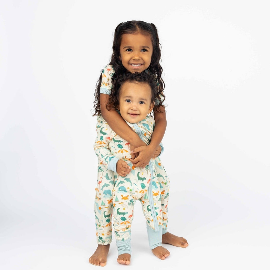 Soft and breathable bamboo pajama set featuring a vibrant Florida-themed print, designed for all-night comfort and easy movement for toddlers and kids.