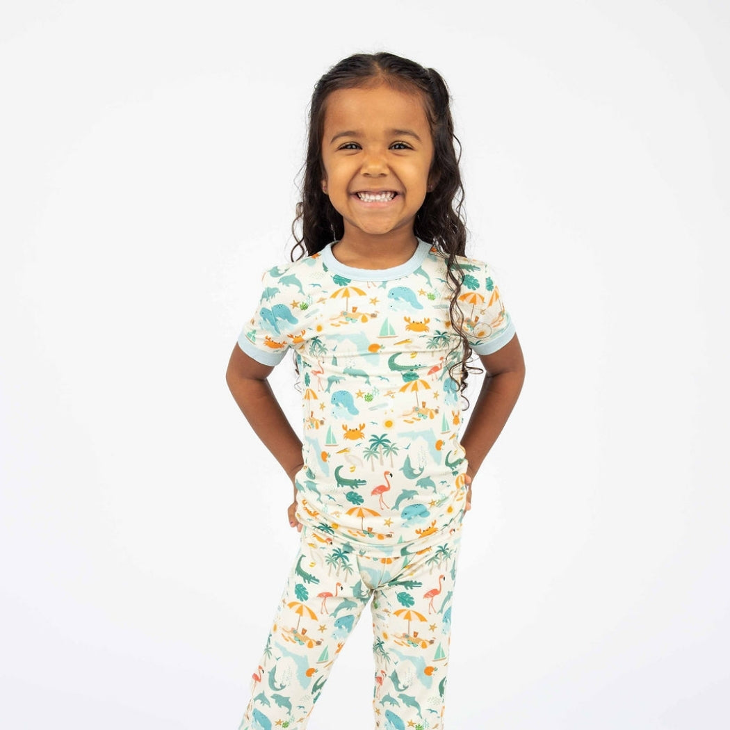 Soft and breathable bamboo pajama set featuring a vibrant Florida-themed print, designed for all-night comfort and easy movement for toddlers and kids.