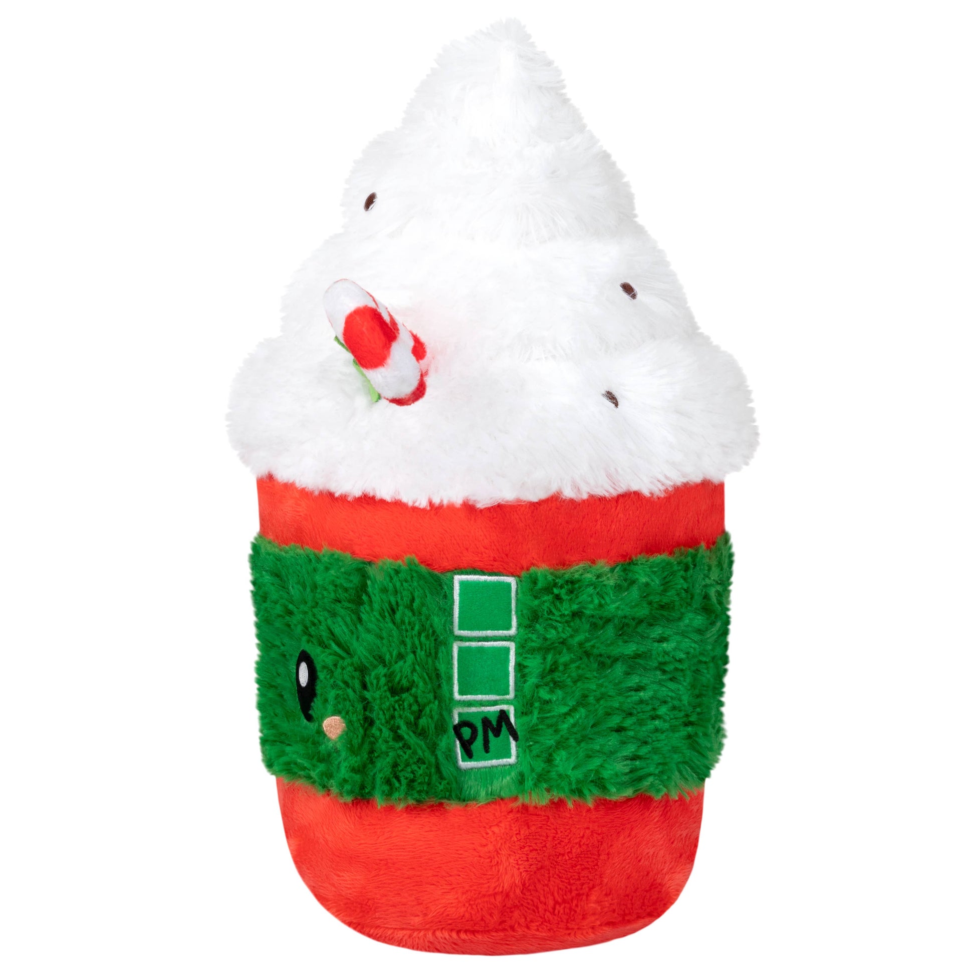 Plush toy resembling a hot chocolate with whipped cream and a cherry on top, wearing green pants with a black 'PM' logo.