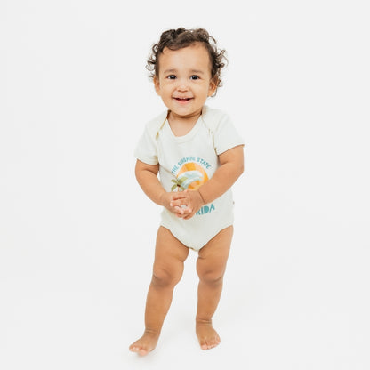 Florida Sunshine State baby onesie – soft & stretchy 100% cotton with unique vintage-inspired print, snap bottom, and fold-over shoulders for easy dressing.