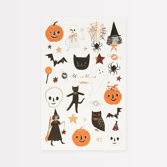 Collection of Halloween-themed tattoos on a white background