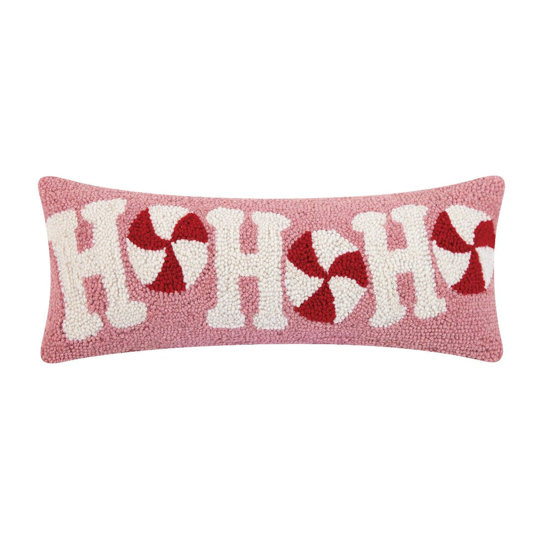 pink pillow with white and red letters saying hohoho