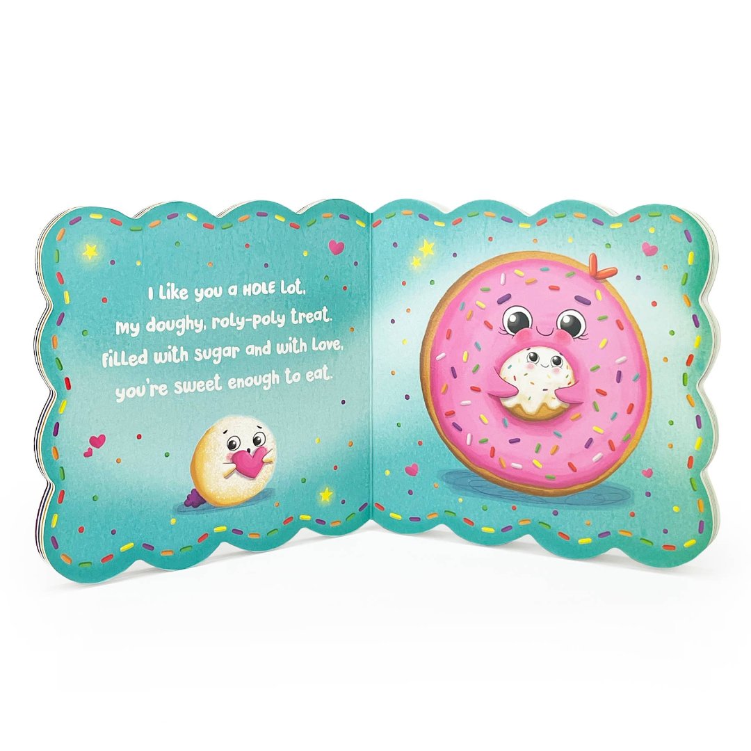 inside of board book showing a donut holding a baby donut hole