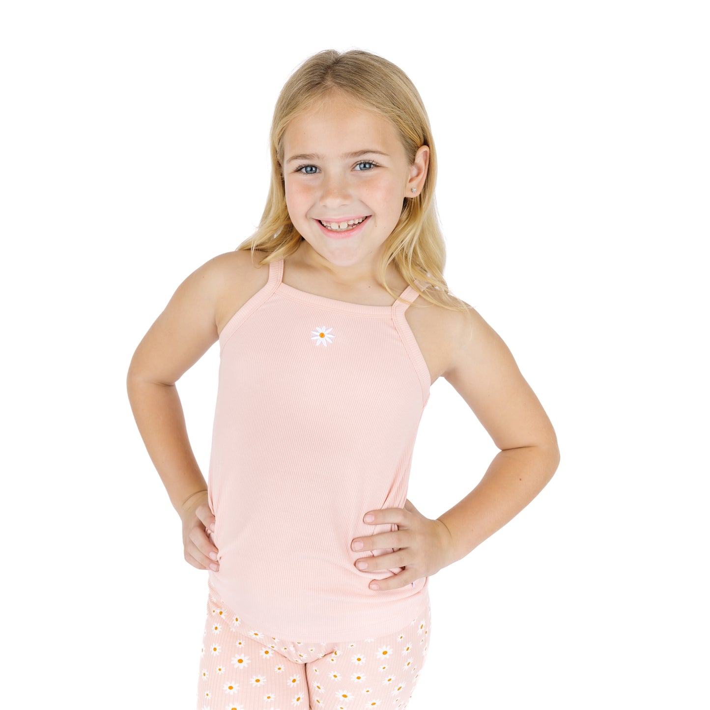 Girl wearing our Pink Embroidery Daisy Bamboo Tank Top in a white background 