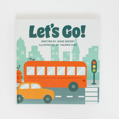 Let's Go Board Book Cover laying on a white flat surface. 