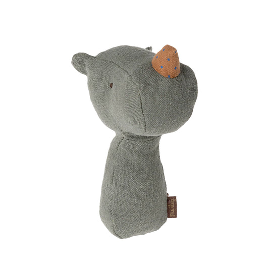 Gray plush toy with a brown patch on a white background