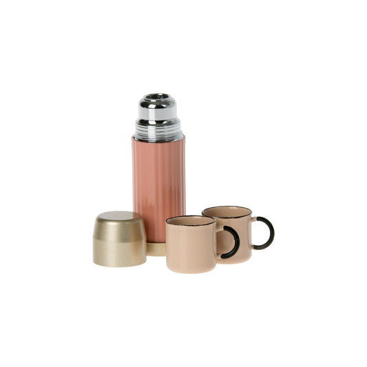 Maileg thermos cups in a white background