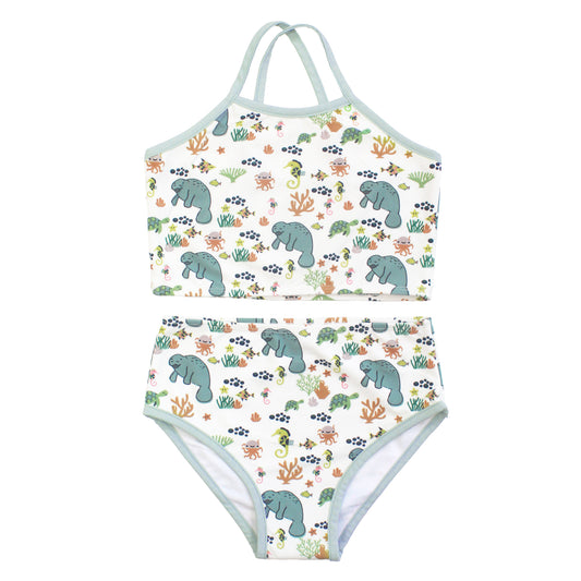 Two-piece swimsuit with manatee and coral pattern on a white background