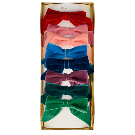 Set of colorful hair bows in a box