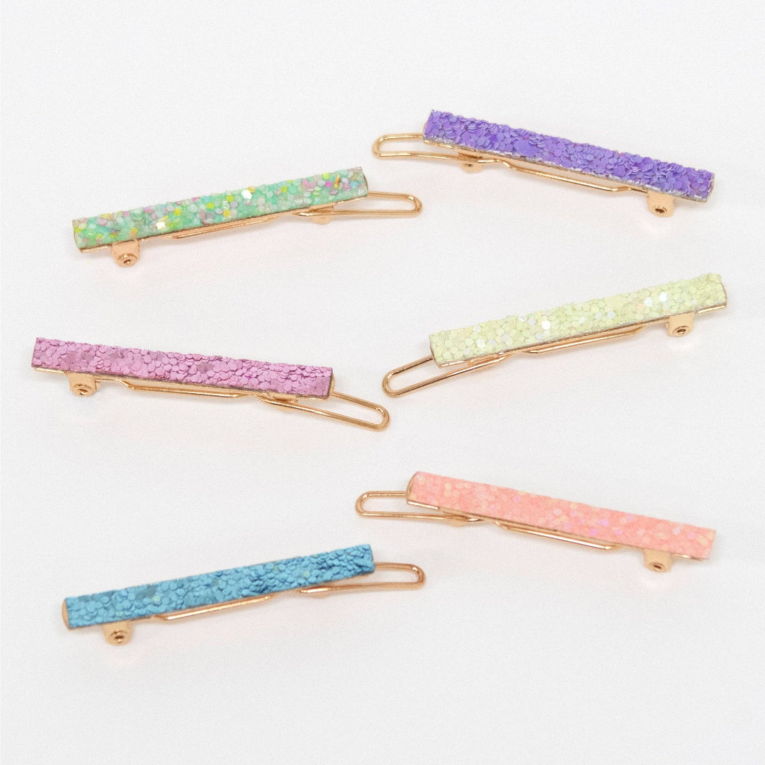Set of colorful barrettes on a white background