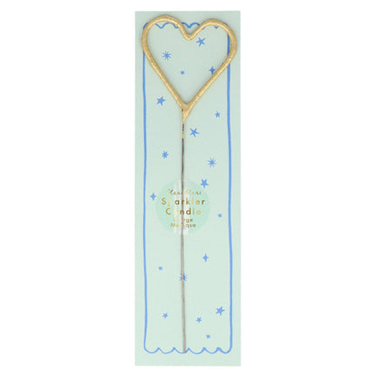 Heart-shaped sparkler on a light green card with blue stars